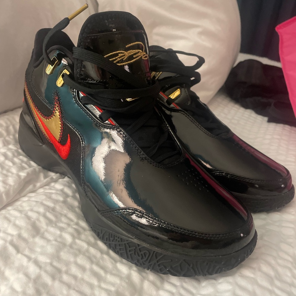 Nike Black and Red Athletic Shoes with High-Top Design LeBron James